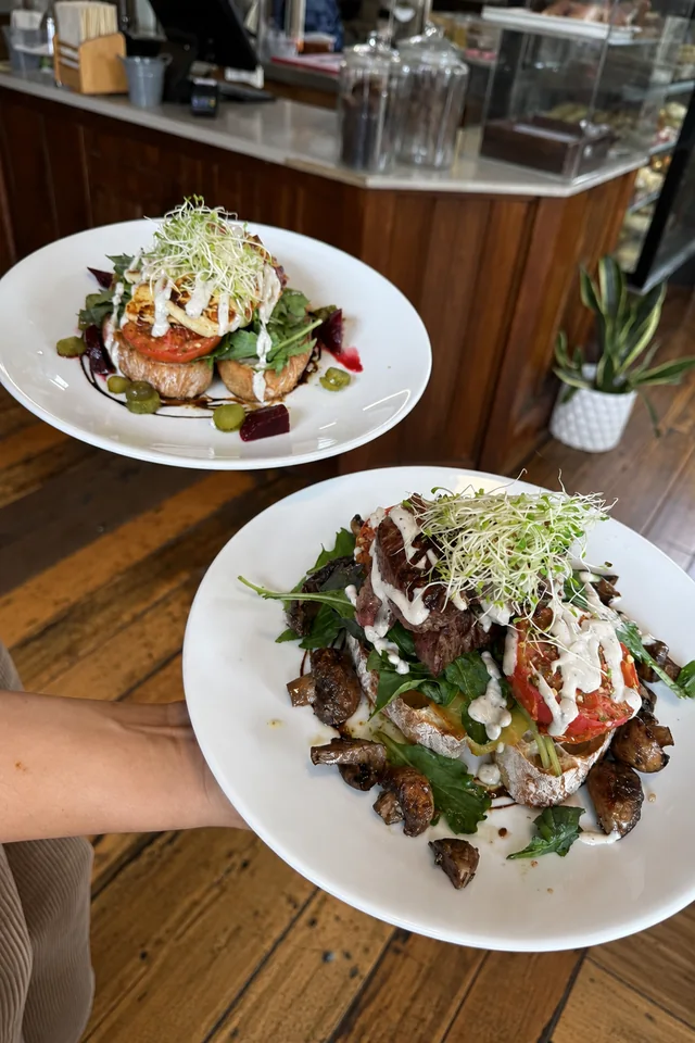 Two plated brunch dishes at Good Habit